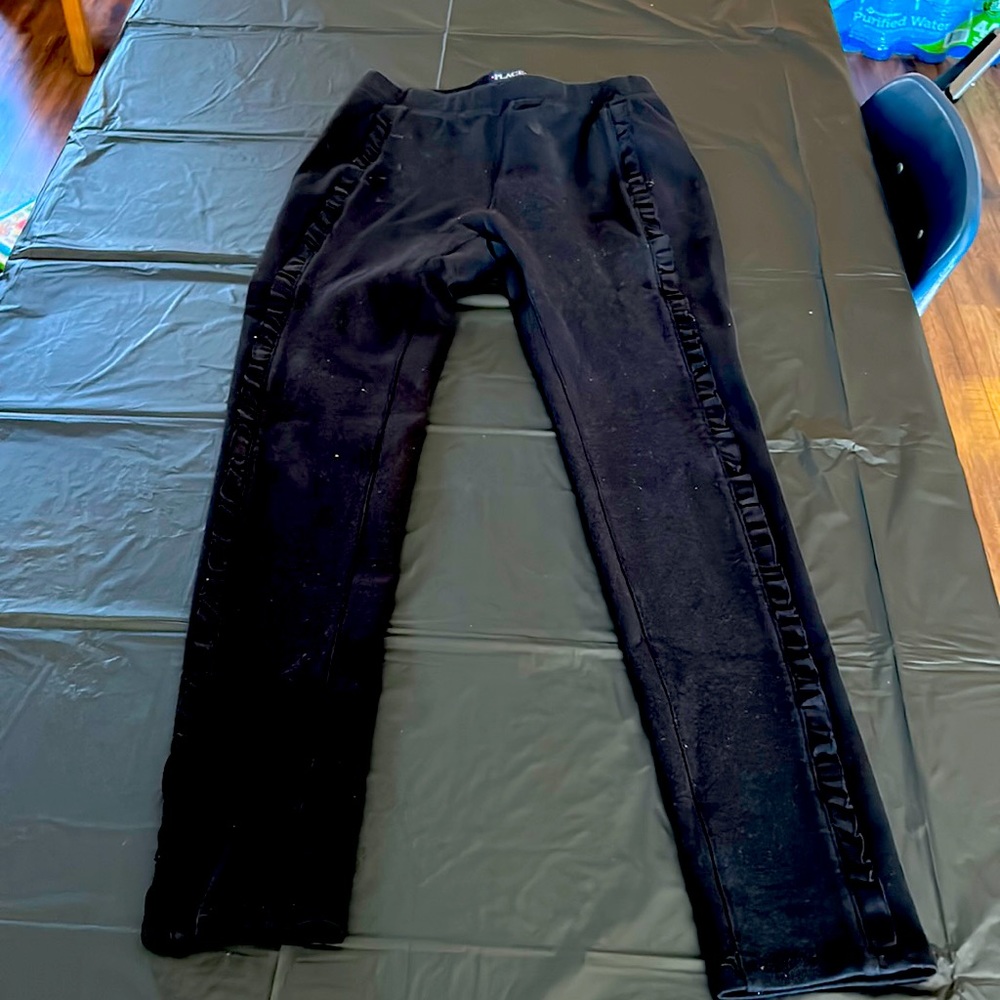 Black ruffled leggings